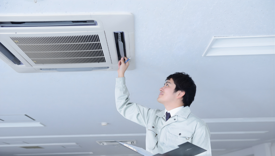 Inspector examining plumbing system in a residential home